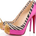 zebra striped upper, gold spikes on toes, pink shiny platform and heel