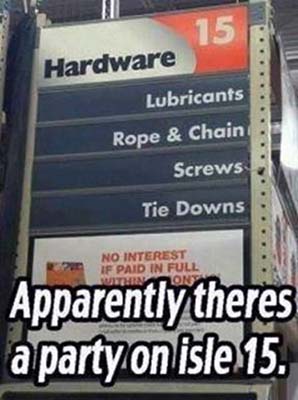 Hardware store sign listing lubricants, ropes, screws and tie downs